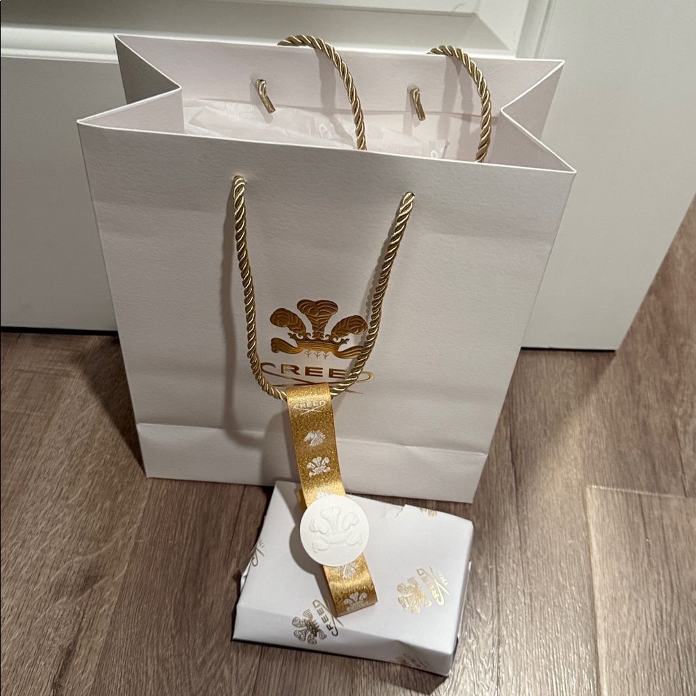 Creed Luxury White and Gold Bag with tissue paper